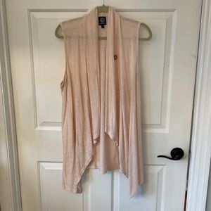 Light pink open or button front vest